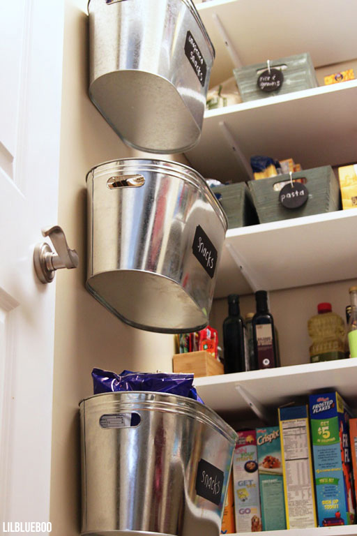 Hang large metal bins from Michaels Craft Store for snack storage